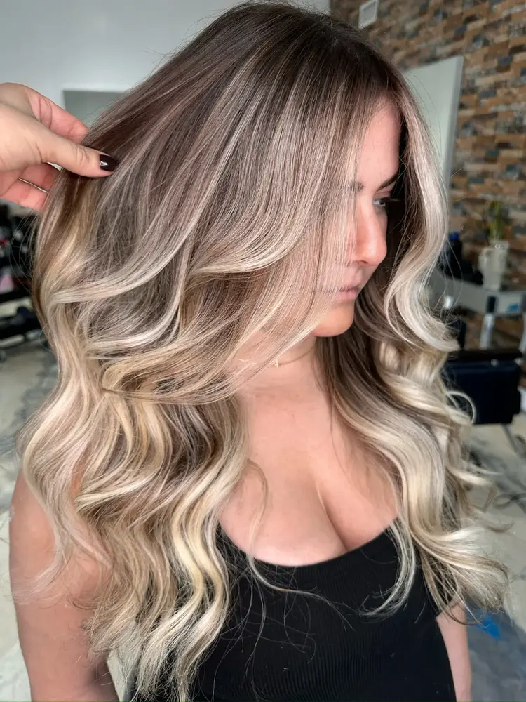 Bright customized balayage result in Miami